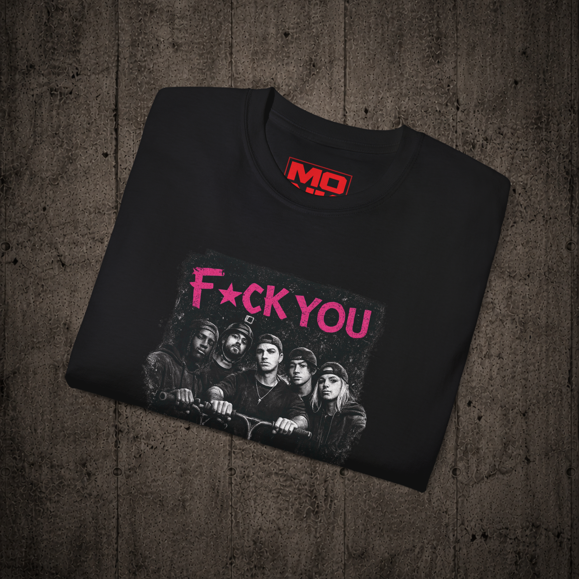 Folded Black F*CK YOU graphic t-shirt by MONK featuring premium streetwear artwork.