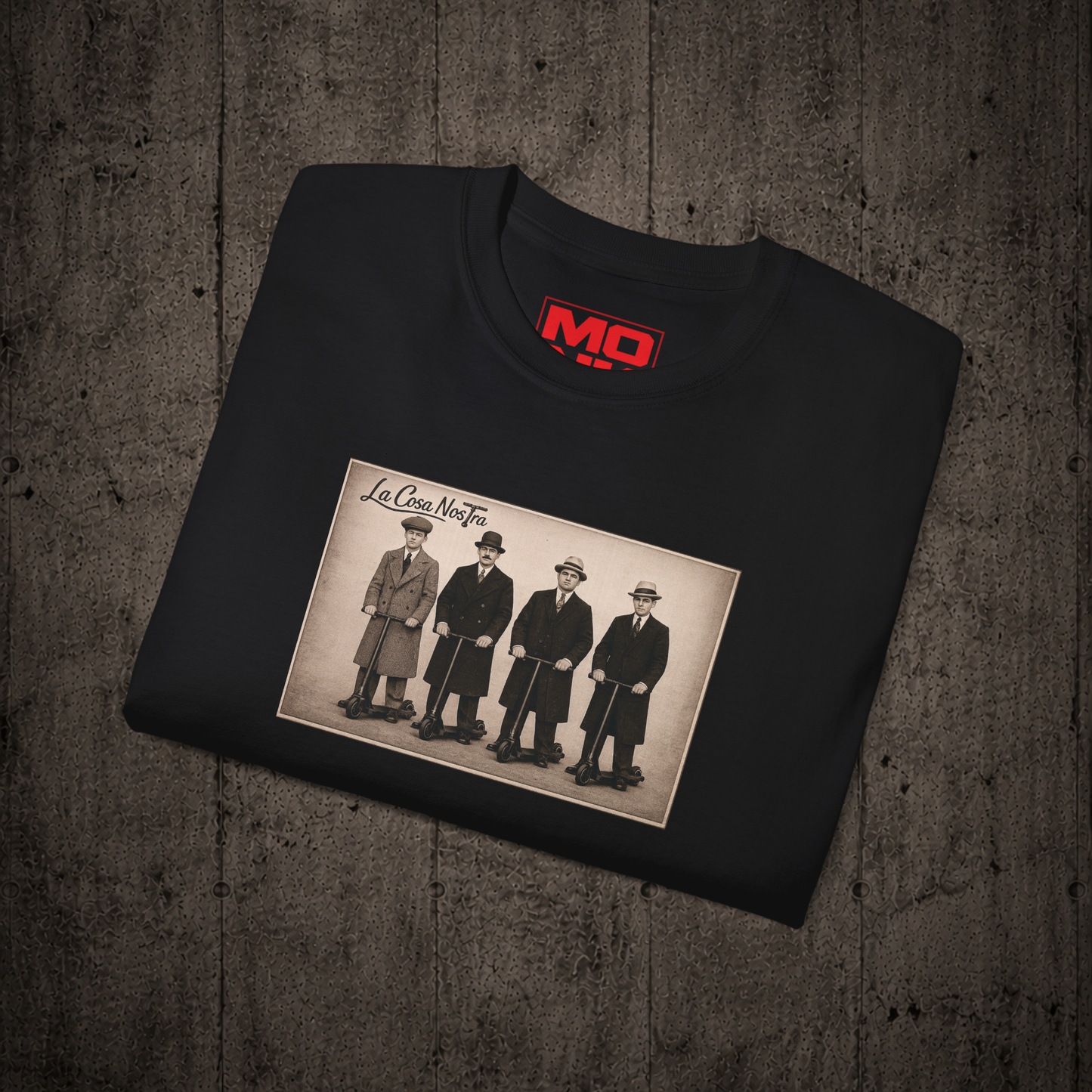 Folded Black La Cosa Nostra graphic t-shirt by MONK featuring premium streetwear artwork.