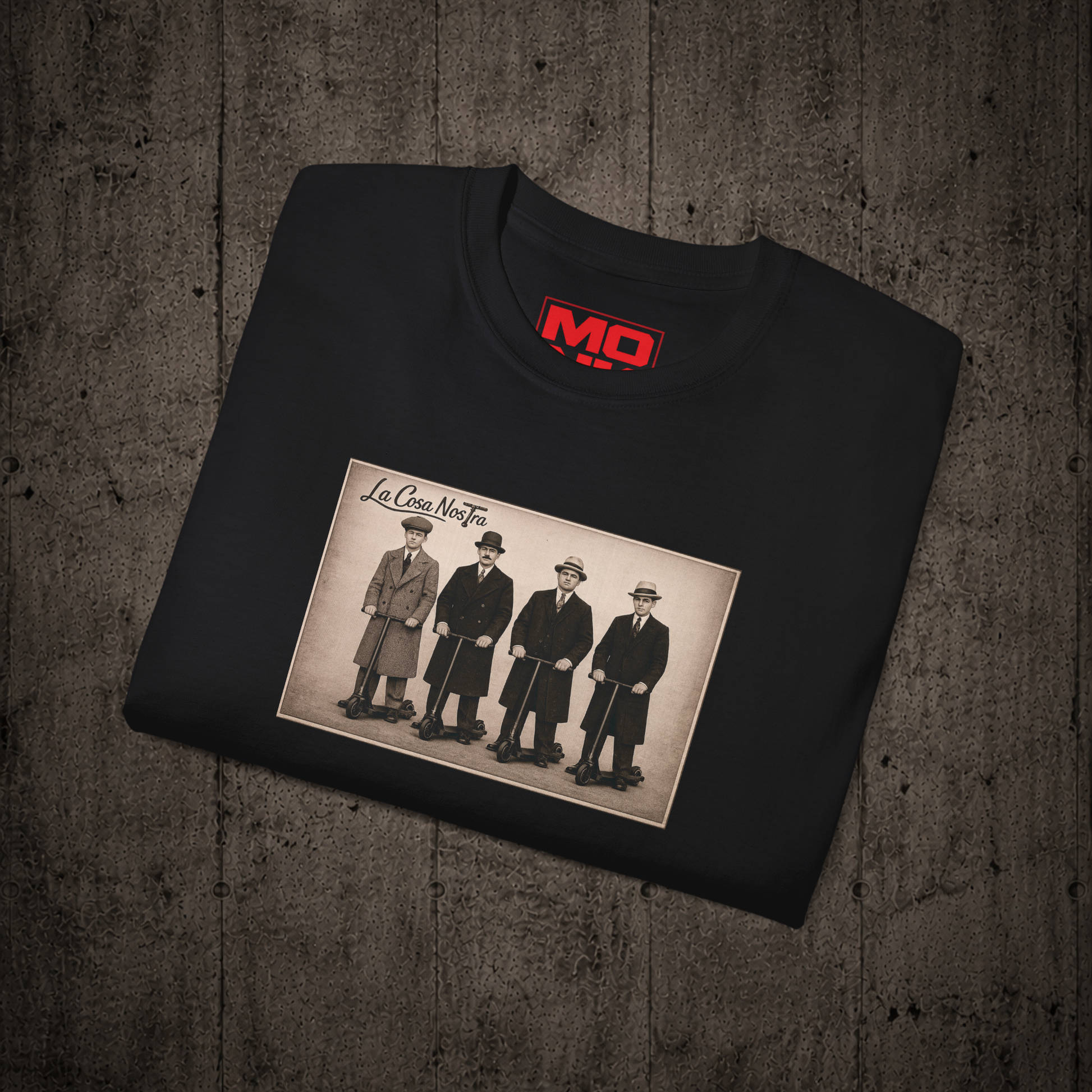 Folded Black La Cosa Nostra graphic t-shirt by MONK featuring premium streetwear artwork.