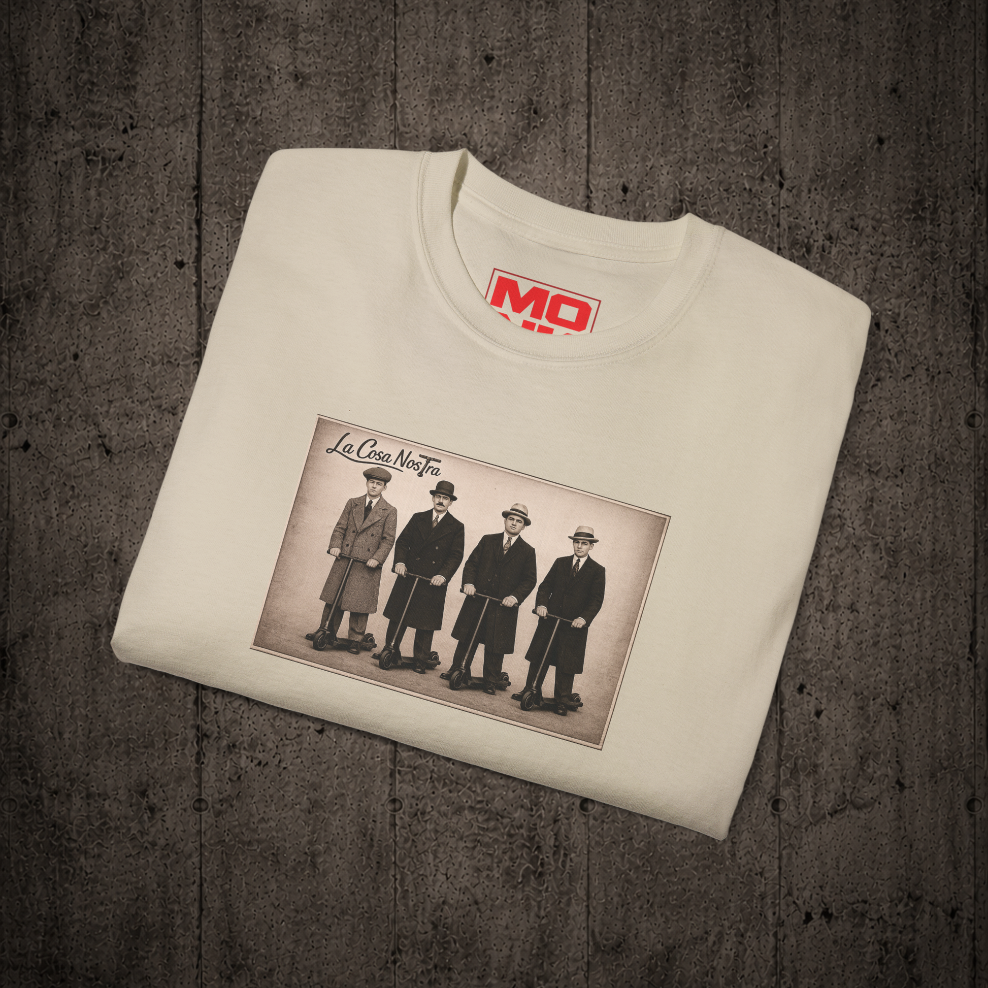 Folded Sand La Cosa Nostra graphic t-shirt by MONK featuring premium streetwear artwork.