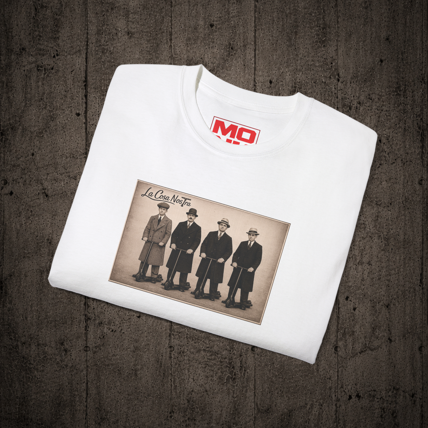 Folded White La Cosa Nostra graphic t-shirt by MONK featuring premium streetwear artwork.