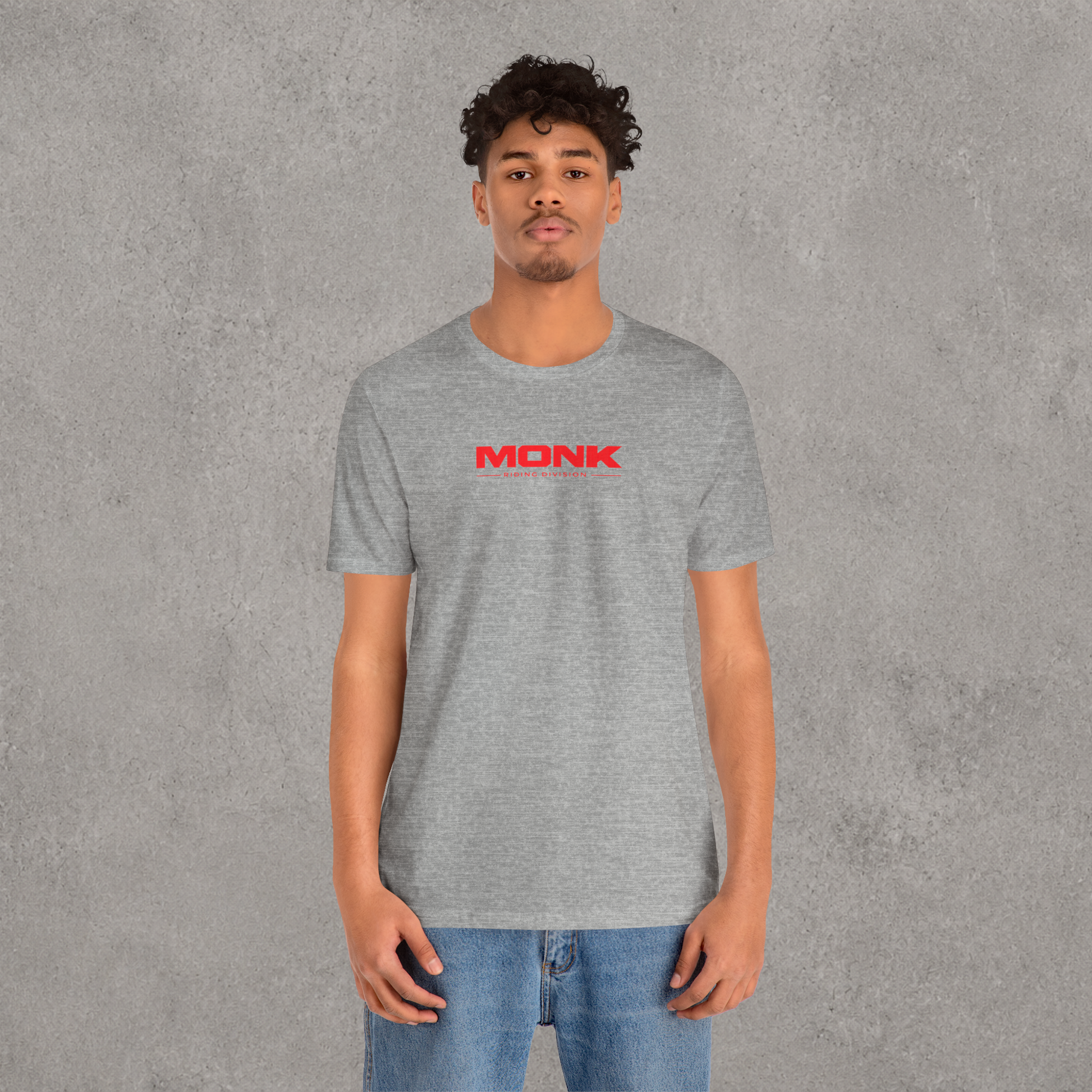 Young rider wearing the Shades of Grey t-shirt in an urban environment inspired by freestyle scootering culture.